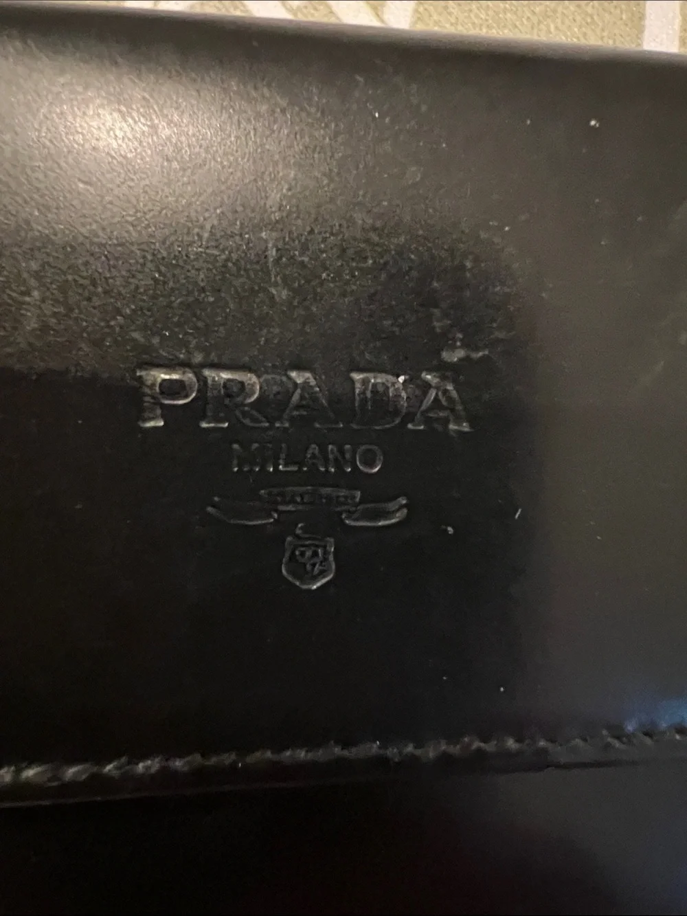 Prada Black Leather Men's Bifold Wallet with Embossed Logo
